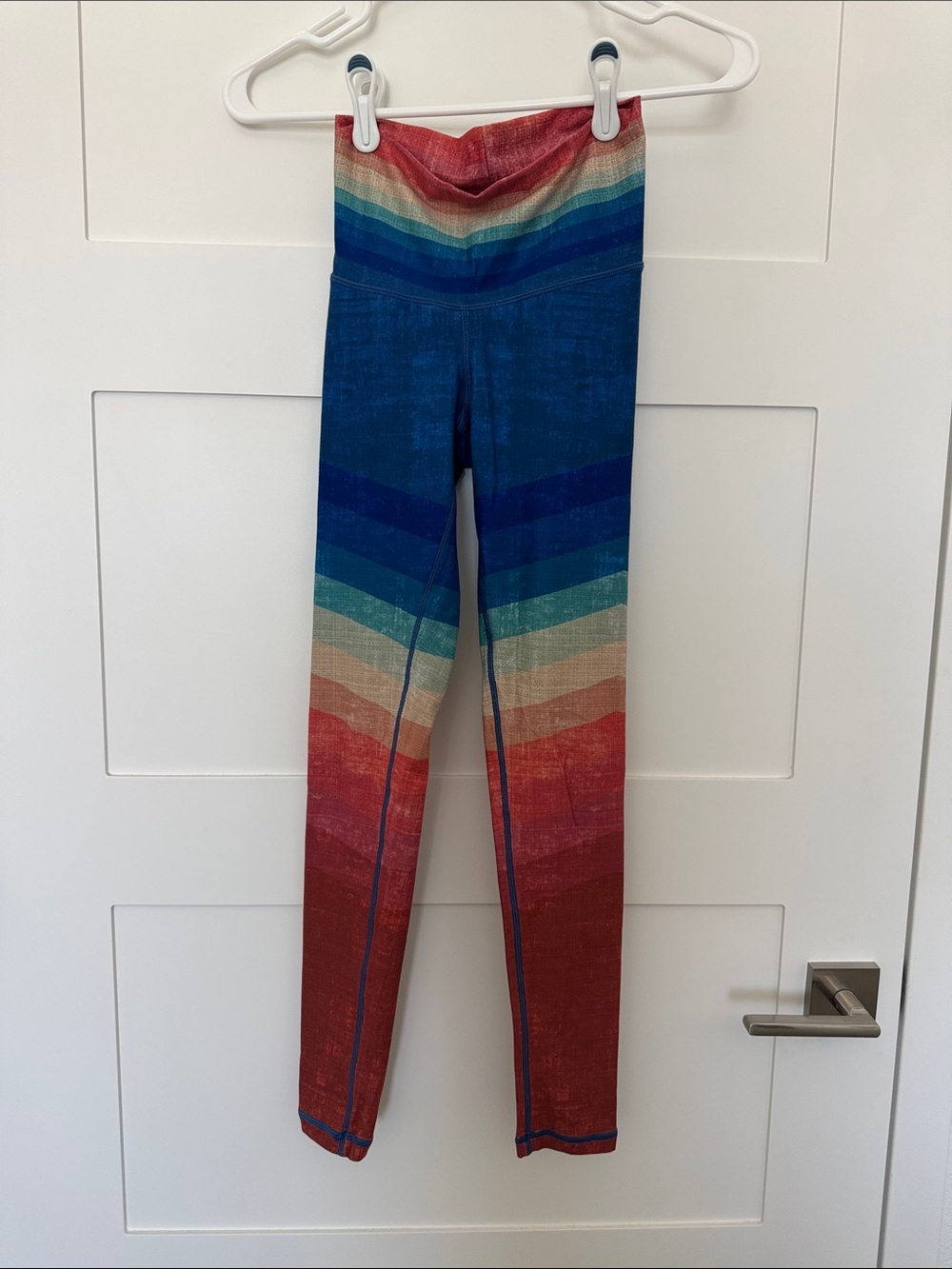 Niyama Sol Rainbow Stripe Active Top in Red, Orange, Cream, Teal, Blue